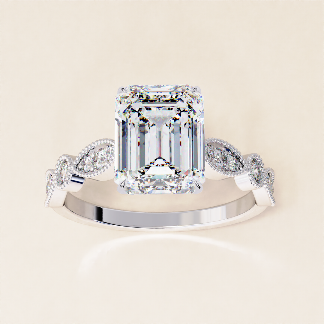 art deco inspired emerald | emerald stone cut ring | emerald pave side ring
