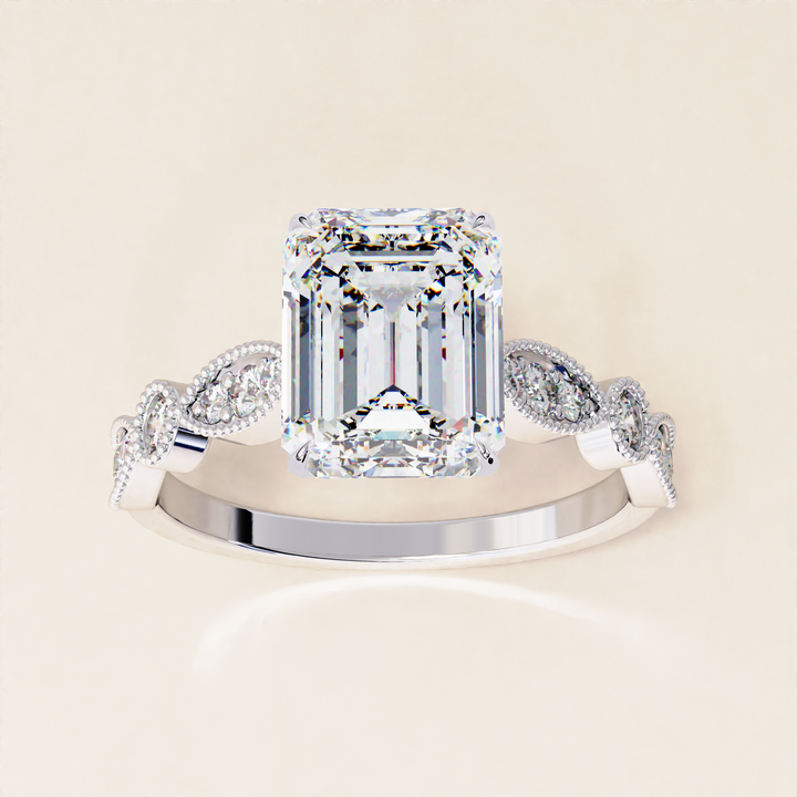 art deco inspired emerald | emerald stone cut ring | emerald pave side ring
