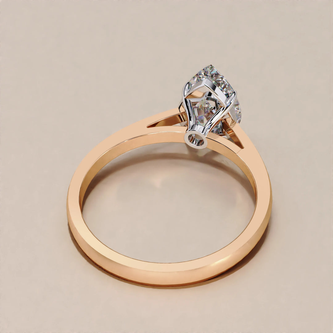 rose gold pear shaped engagement ring