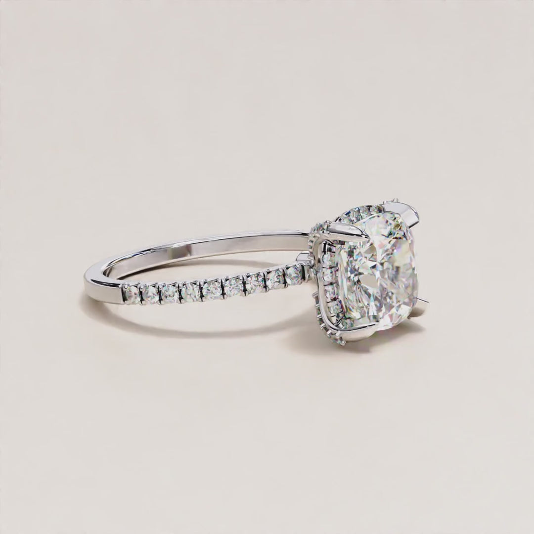 Timeless Brilliance: Cushion Cut Diamond Halo Ring with Pave Accents